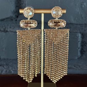 DEEPA GUNARI at ANTHROPOLOGIE gold, brass statement chandelier earrings.